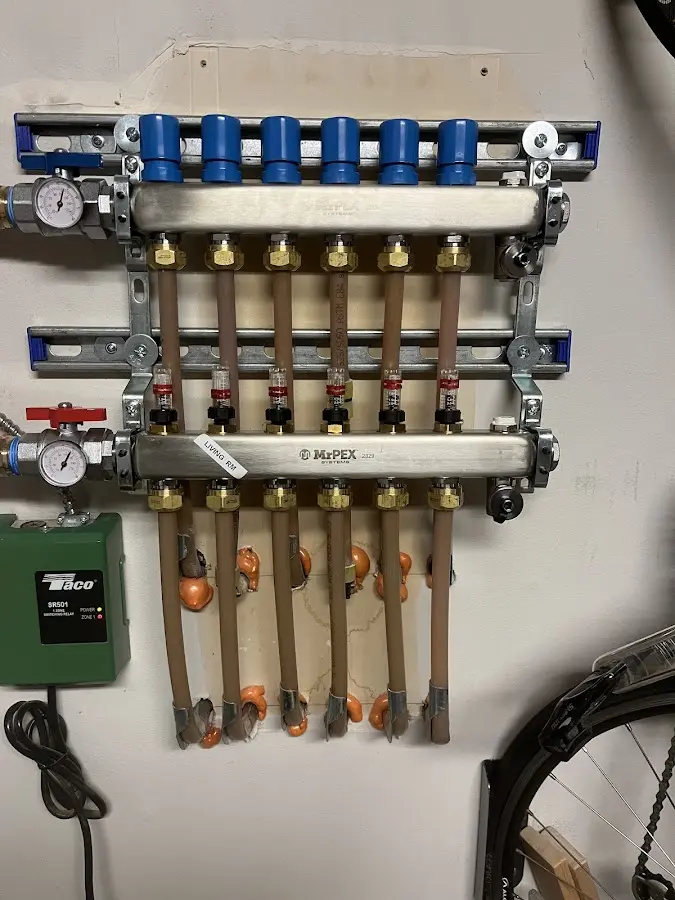 Plumber performing Water Heater Repair at a residential property in Glenolden